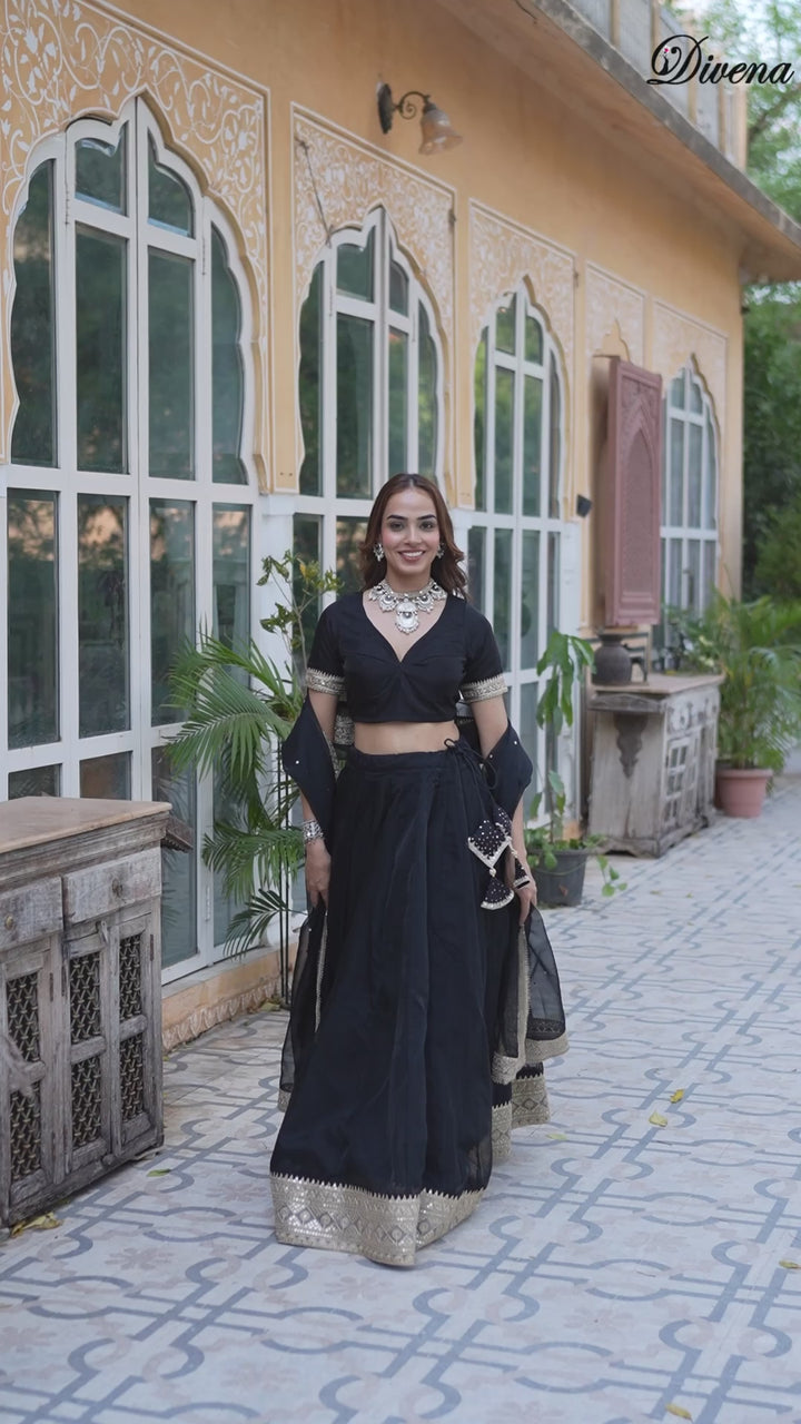 Divena Black Solid Organza Lehenga with Choli and Dupatta