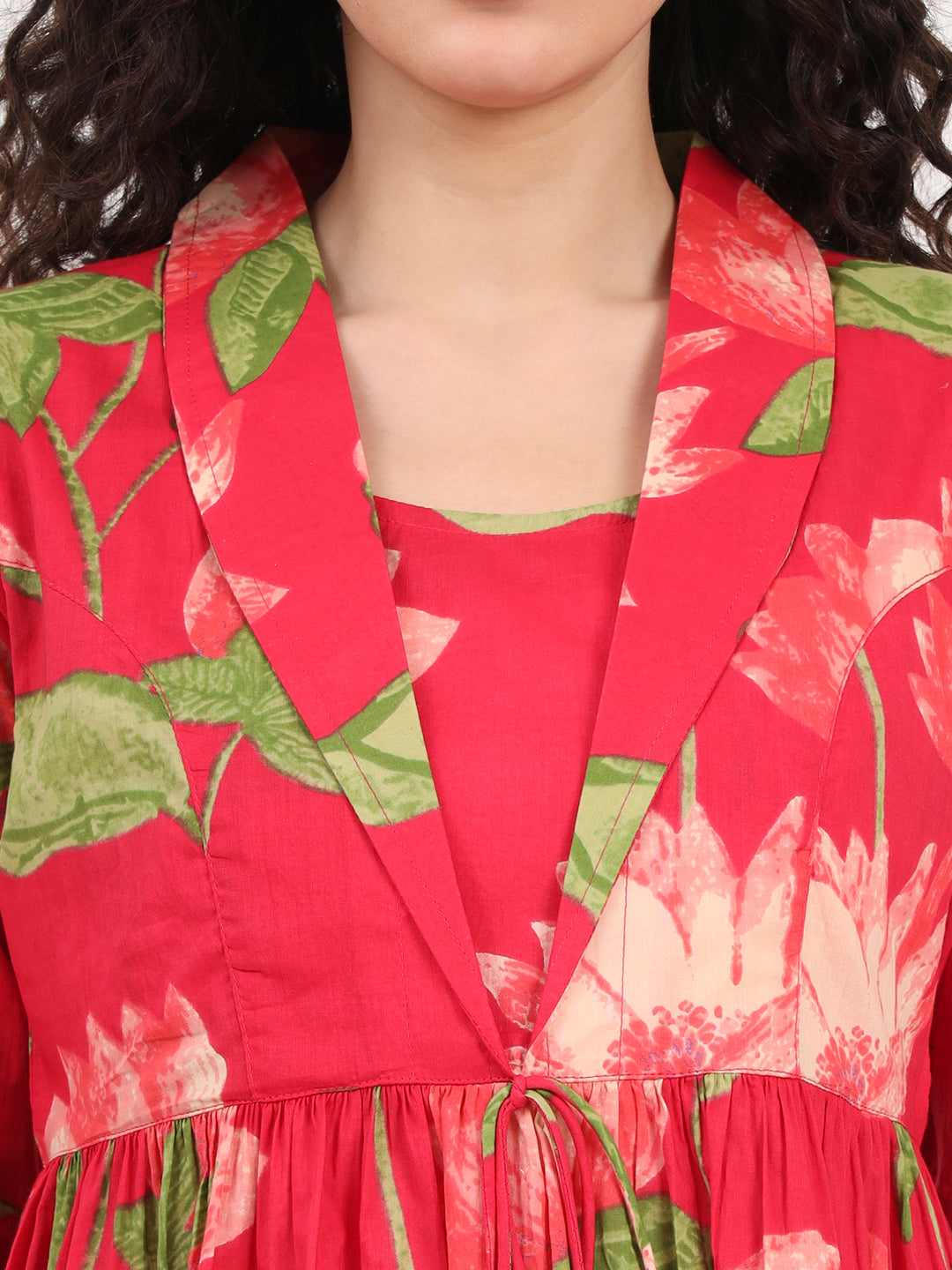 Divena Green Floral Printed Cotton Lepal Neck Peplum Top