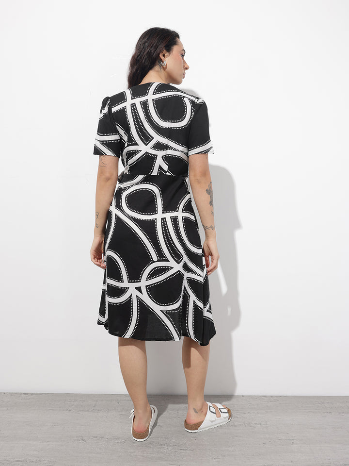 Divena Black Lepal Neck Abstract Print Rayon Midi Dress